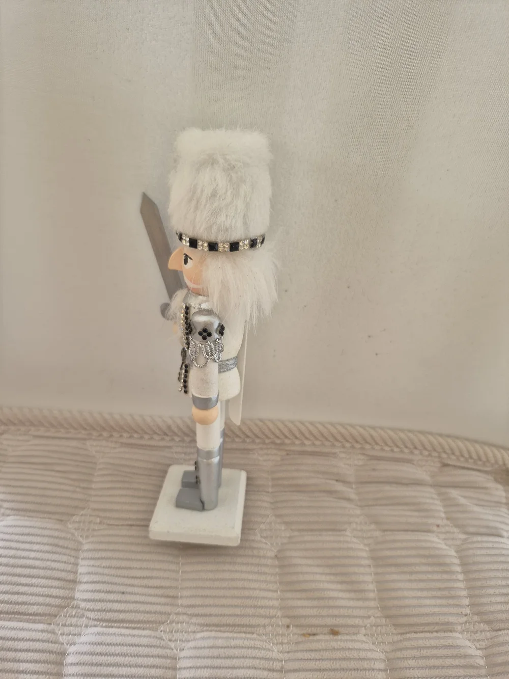 White and Silver Nutcracker Figurine with Faux Fur Hat